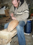 Brian continuing the chiselling of his hull.